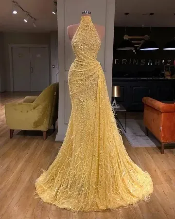 https://radhedesigner.com/images/thumbs/000/0000135_evening-gowns_450.webp