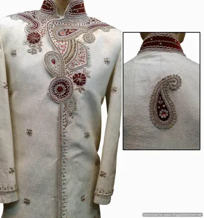 https://radhedesigner.com/images/thumbs/000/0000877_elegant-butter-cream-brocade-silk-indian-wedding-sherwa_450.webp