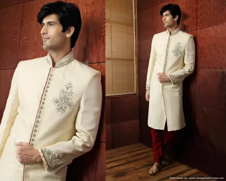 https://radhedesigner.com/images/thumbs/000/0000885_elegant-off-white-brocade-silk-indian-wedding-sherwani_450.webp