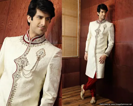 https://radhedesigner.com/images/thumbs/000/0000887_elegant-red-jacquard-silk-indian-wedding-sherwani-for-m_450.webp