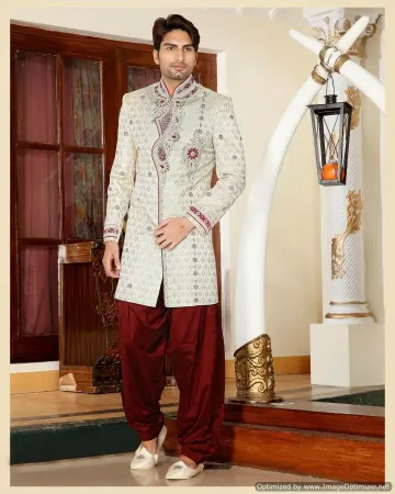 https://radhedesigner.com/images/thumbs/000/0000929_ethnic-tan-brown-jute-silk-and-velvet-indian-wedding-sh_450.webp