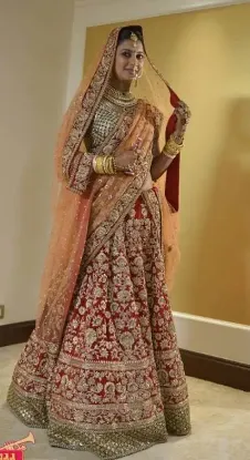 Picture of chaniya choli with bandhani dupatta,lehenga saree below