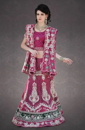 https://radhedesigner.com/images/thumbs/000/0005398_embroidered-designer-lehenga-choli-indian-bridal-weddi_450.webp