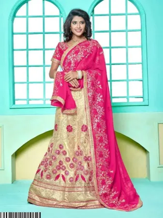 https://radhedesigner.com/images/thumbs/000/0005936_indian-designer-beige-embroidered-bollywood-style-net-w_450.webp