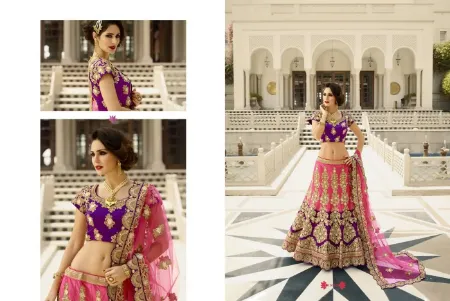 https://radhedesigner.com/images/thumbs/000/0007599_navratri-special-skin-magenta-lehenga-choli-indian-wedd_450.webp