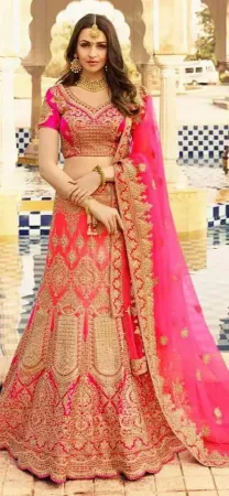 https://radhedesigner.com/images/thumbs/000/0007675_net-lehenga-cutting-videor-rajkumar-lehenga-onlinechan_450.webp