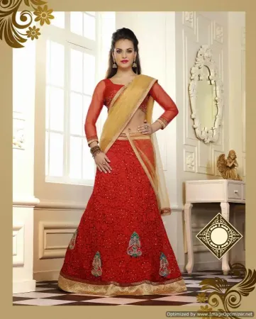 https://radhedesigner.com/images/thumbs/000/0007749_net-orange-lehengalehenga-zari-workchaniya-cholicholi_450.webp