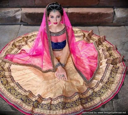 Picture of peach colour indian bollywood wedding partywear designe