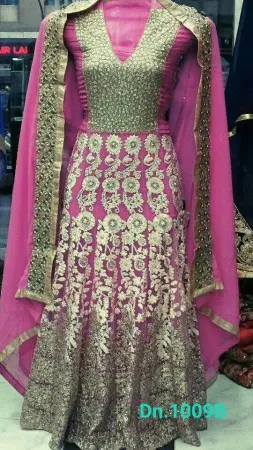 https://radhedesigner.com/images/thumbs/000/0008405_red-embellished-lehenga-set-choli-dresscholilehenga_450.webp