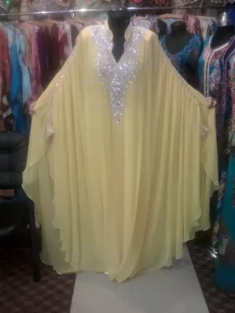 https://radhedesigner.com/images/thumbs/001/0019595_caftan-jacketfarasha-vlinderbridal-dress-knee-length_450.webp