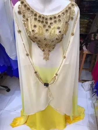 https://radhedesigner.com/images/thumbs/002/0021963_gold-thobeparty-wear-usaabayajilbabkaftan-dressdub_450.webp