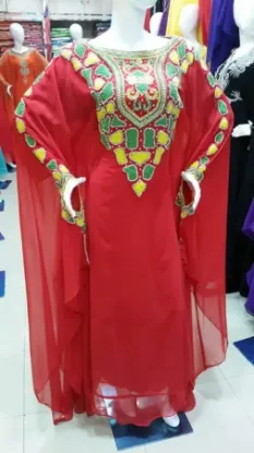 Picture of indian embroidered red kaftan with silver color beads a