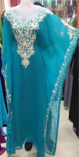 Picture of simple beautiful hand made dubai kaftan with unique de,