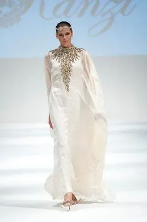 https://radhedesigner.com/images/thumbs/002/0025312_thobe-in-qatarparty-wear-wedgesabayajilbabkaftan-dr_450.webp