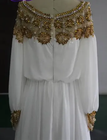 https://radhedesigner.com/images/thumbs/002/0027738_beach-dress-hand-made-embroidery-party-wear-farasha-max_450.webp