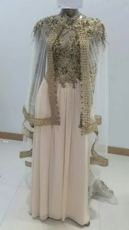 https://radhedesigner.com/images/thumbs/002/0028499_modest-maxi-gown-modern-caftan-bridal-takshita-wedding_450.webp