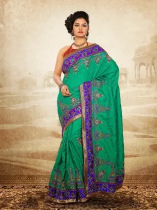 Picture of green designer embroidered zari border bollywood style,