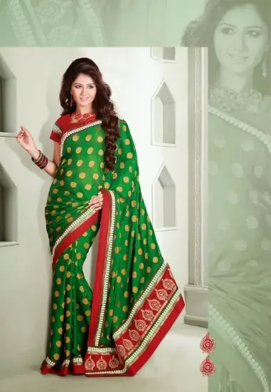 Picture of green indiandesigner saree full stone work saree grand 