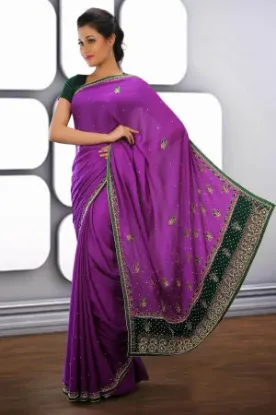 Picture of indian bollywood tissue saree with zari work and contra