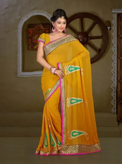 Picture of indian bollywood traditional bhandej yellow work sari ,