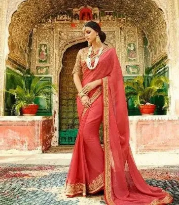 Picture of indian designer zari border work peach bollywood sari ,