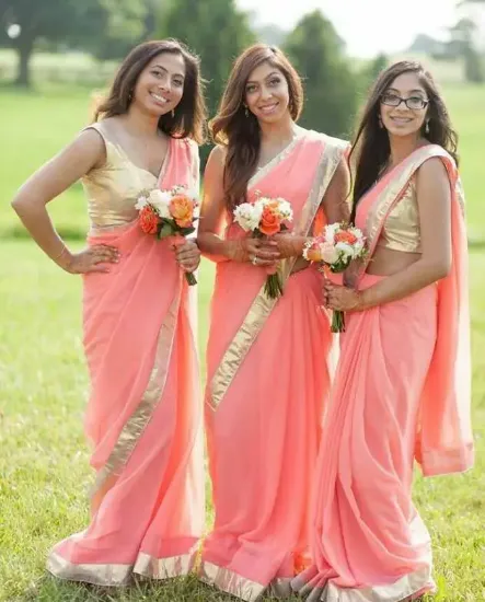 Picture of indian orange sari embroidered women dress party wear ,