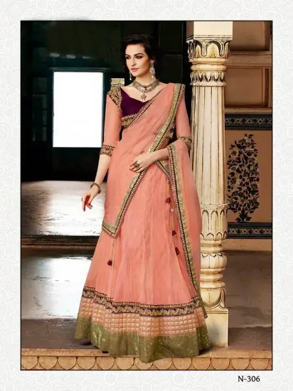 Picture of traditional bollywood zari border party wear sari oran,