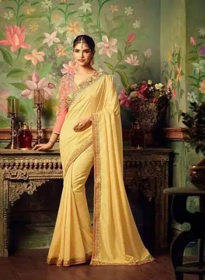 Picture of wedding wear brown bollywood eligent sari georgette pa,