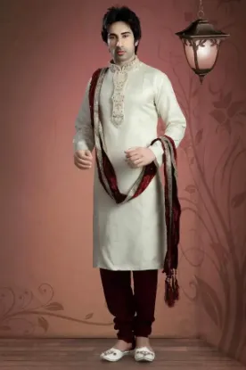 Picture of cream brocade silk indian wedding indowestern sherwani 